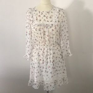 Print ruffled mini flower dress.